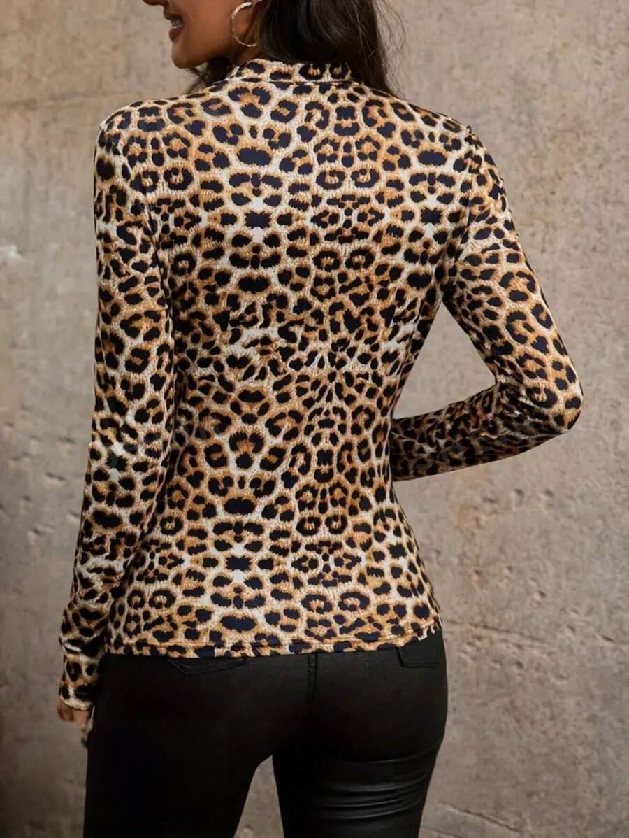 Women's fitted top with leopard print and openwork details, long sleeves